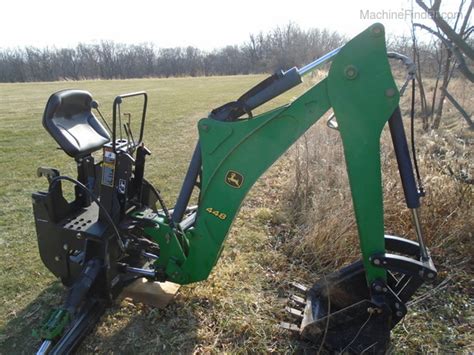 Approximately 12' reach with an 18" bucket Will adapt to other tractors. . John deere 448 backhoe for sale